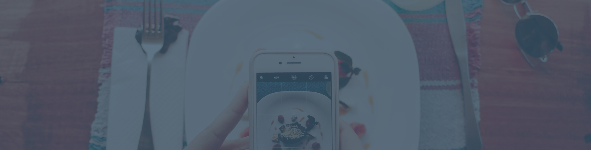 person-taking-close-up-photo-of-their-food-at-restaurant